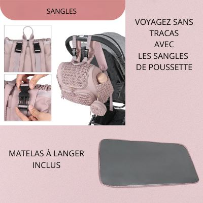 Sac à dos à langer rose avec matelas à langer et sangles sur la poignée d'une poussette.